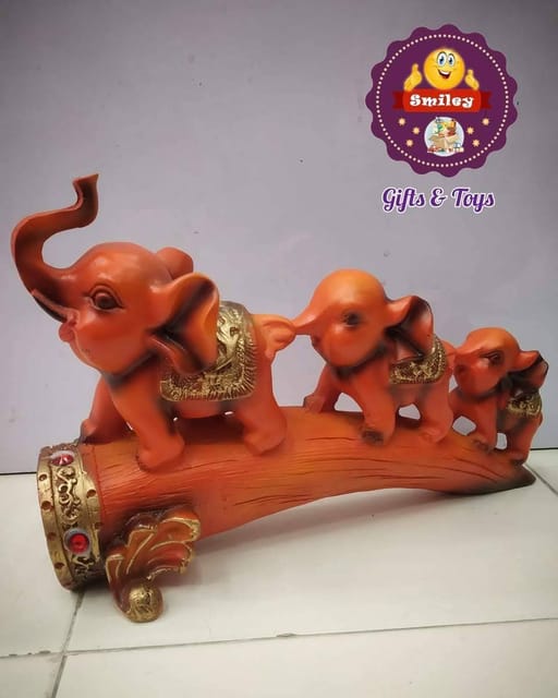Elephant Family on a Broken Tusk Ceramic Showpiece